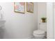Simple toilet and sink with updated flooring at 7995 E Mississippi Ave # G5, Denver, CO 80247