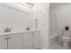 Clean bathroom with double vanity and shower/tub combo at 7995 E Mississippi Ave # G5, Denver, CO 80247