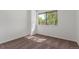 Bright bedroom with large window and carpet flooring at 7995 E Mississippi Ave # G5, Denver, CO 80247