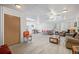 Bright and airy common area with kitchen, seating, and lots of natural light at 7995 E Mississippi Ave # G5, Denver, CO 80247