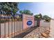 Community entrance with sign for Hiland Hills Townhomes at 7995 E Mississippi Ave # G5, Denver, CO 80247