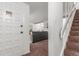Inviting entryway with view of living room and staircase at 7995 E Mississippi Ave # G5, Denver, CO 80247