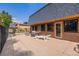 Community patio with grill and lounge chair at 7995 E Mississippi Ave # G5, Denver, CO 80247