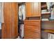 Walk-in closet with custom shelves and hanging space, designed for organization at 9375 S Hoyt Ct, Littleton, CO 80127