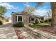Charming single-story home with tidy landscaping, stone accents, and an inviting walkway at 4550 Zephyr St, Wheat Ridge, CO 80033