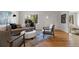Stylish living room featuring hardwood floors, modern furniture, and bright natural light at 4550 Zephyr St, Wheat Ridge, CO 80033
