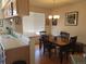 Cozy dining area adjacent to the kitchen, perfect for Gathering meals at 2240 S Pagosa Ct # B, Aurora, CO 80013
