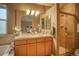 Bathroom features double sinks, shower, and bathtub at 2479 S High St, Denver, CO 80210