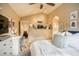 Bright bedroom featuring vaulted ceiling, and desk area at 2479 S High St, Denver, CO 80210
