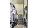 Walk-in closet providing ample storage space for clothes and shoes at 2479 S High St, Denver, CO 80210