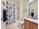 Bathroom featuring shower with tub, and a single sink vanity at 15700 E Jamison Dr # 7-203, Englewood, CO 80112