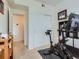 Exercise room featuring carpet and lots of storage at 15700 E Jamison Dr # 7-203, Englewood, CO 80112
