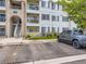 Apartment complex exterior showing stairwell, and parking lot at 15700 E Jamison Dr # 7-203, Englewood, CO 80112