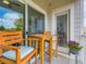 Apartment patio featuring seating for two and sliding glass door at 15700 E Jamison Dr # 7-203, Englewood, CO 80112