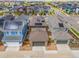 Aerial view of neighborhood homes with solar panels in a well-maintained residential community at 21482 E 60Th Ave, Aurora, CO 80019