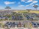 Neighborhood aerial view points out local destinations like the Gaylord Rockies and Prairie Paws Park at 21482 E 60Th Ave, Aurora, CO 80019