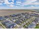 This aerial view highlights the planned community and its proximity to open land at 21482 E 60Th Ave, Aurora, CO 80019