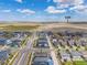 The aerial view shows a well-planned community with E-470 in the distance at 21482 E 60Th Ave, Aurora, CO 80019