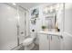 Contemporary bathroom offers a glass-enclosed shower, modern vanity, and sleek fixtures at 21482 E 60Th Ave, Aurora, CO 80019