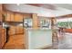 Open kitchen with an island, modern appliances, and plenty of storage space at 2397 Hearth Dr, Evergreen, CO 80439