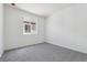 Inviting bedroom features neutral carpet and a window for natural light at 19100 E 96Th Pl, Commerce City, CO 80022