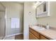 Clean bathroom with a shower, storage cabinet, vanity and sink at 3912 Ute Mountain Trl, Castle Rock, CO 80109