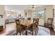 Inviting dining area featuring a large wooden table, perfect for Gathering meals and gatherings at 3912 Ute Mountain Trl, Castle Rock, CO 80109