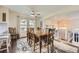 Open dining area with modern decor, seamlessly flowing into the adjacent living spaces at 3912 Ute Mountain Trl, Castle Rock, CO 80109