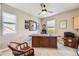 Inviting home office with a ceiling fan and a large desk for productivity at 3912 Ute Mountain Trl, Castle Rock, CO 80109