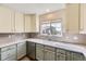 Updated kitchen with stone countertops, stainless appliances, and backsplash tiling at 3912 Ute Mountain Trl, Castle Rock, CO 80109