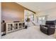 Comfortable living room with modern entertainment center, creating an inviting space for relaxation at 3912 Ute Mountain Trl, Castle Rock, CO 80109