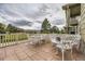 Relaxing patio area with ample seating, ideal for outdoor entertaining and enjoying scenic views at 3912 Ute Mountain Trl, Castle Rock, CO 80109