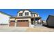 Attractive two-story home with a two-car garage and welcoming porch at 16830 Mckay Dr, Mead, CO 80542