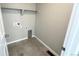 Functional laundry room with tile flooring and utility connections at 16830 Mckay Dr, Mead, CO 80542