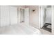 Bedroom features neutral tones, carpet flooring and multiple closets and doorways at 5910 W Sumac Ave, Littleton, CO 80123
