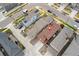 Aerial view of a residential property showcasing the roof, driveway, and surrounding neighborhood at 15842 E Warner Dr, Denver, CO 80239