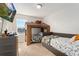 bedroom with built in bed and fun decor at 15842 E Warner Dr, Denver, CO 80239