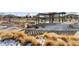 Community covered patio and grilling area at 15842 E Warner Dr, Denver, CO 80239
