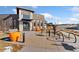 Community clubhouse with bike racks and seating at 15842 E Warner Dr, Denver, CO 80239