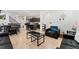 Open concept kitchen with island, stainless steel appliances, and dark cabinets at 15842 E Warner Dr, Denver, CO 80239