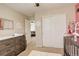 This Bedroom includes a large closet, changing table and decorations on the walls at 4316 S Netherland St, Aurora, CO 80015