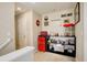 Bonus room featuring a snack bar, mini fridge, and fun decorations at 4316 S Netherland St, Aurora, CO 80015