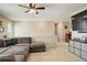 Spacious bonus room with comfortable seating and a snack bar at 4316 S Netherland St, Aurora, CO 80015