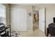 This home office includes a large closet, big window and door that leads to the hallway at 4316 S Netherland St, Aurora, CO 80015