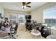 Spacious office features bright windows, multiple desks, and lots of natural light at 4316 S Netherland St, Aurora, CO 80015