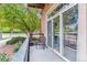 Relaxing balcony featuring comfortable seating and lush greenery at 5677 S Park Pl # A102, Englewood, CO 80111