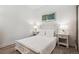 Comfortable bedroom featuring hardwood floors, and soft, neutral colors at 5677 S Park Pl # A102, Englewood, CO 80111