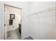 Walk-in closet leading to bathroom at 5677 S Park Pl # A102, Englewood, CO 80111