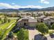 Beautiful aerial view of a well-maintained home in a neighborhood with mountain views at 2373 S Joyce St, Denver, CO 80228