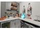 Stylish bar area with custom shelving, wine fridges, and countertops at 2373 S Joyce St, Denver, CO 80228